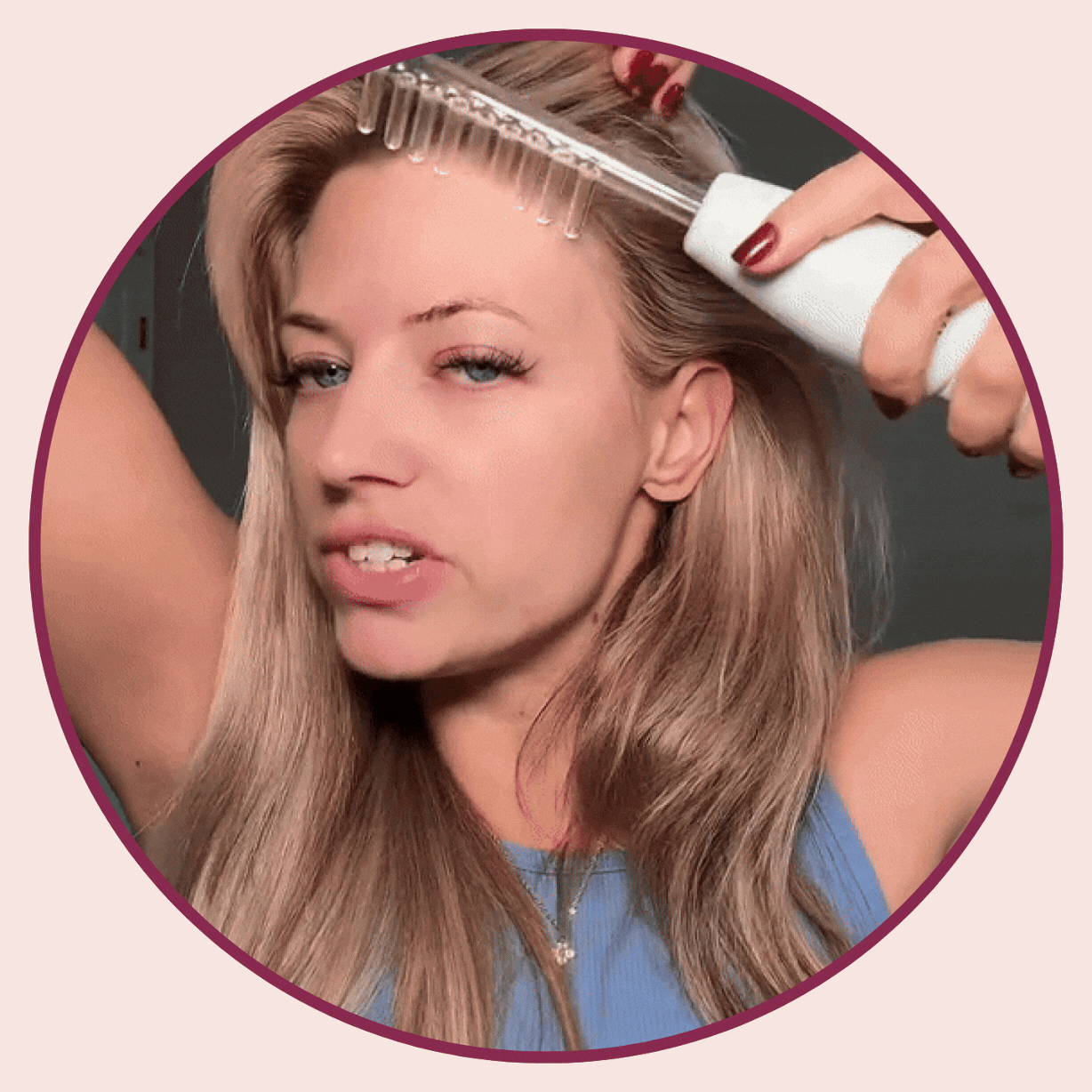 A woman demonstrating the HairRevive Pro™ LLUCCI Product